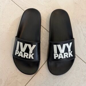 IVY PARK Black Slide Sandals with White Logo
